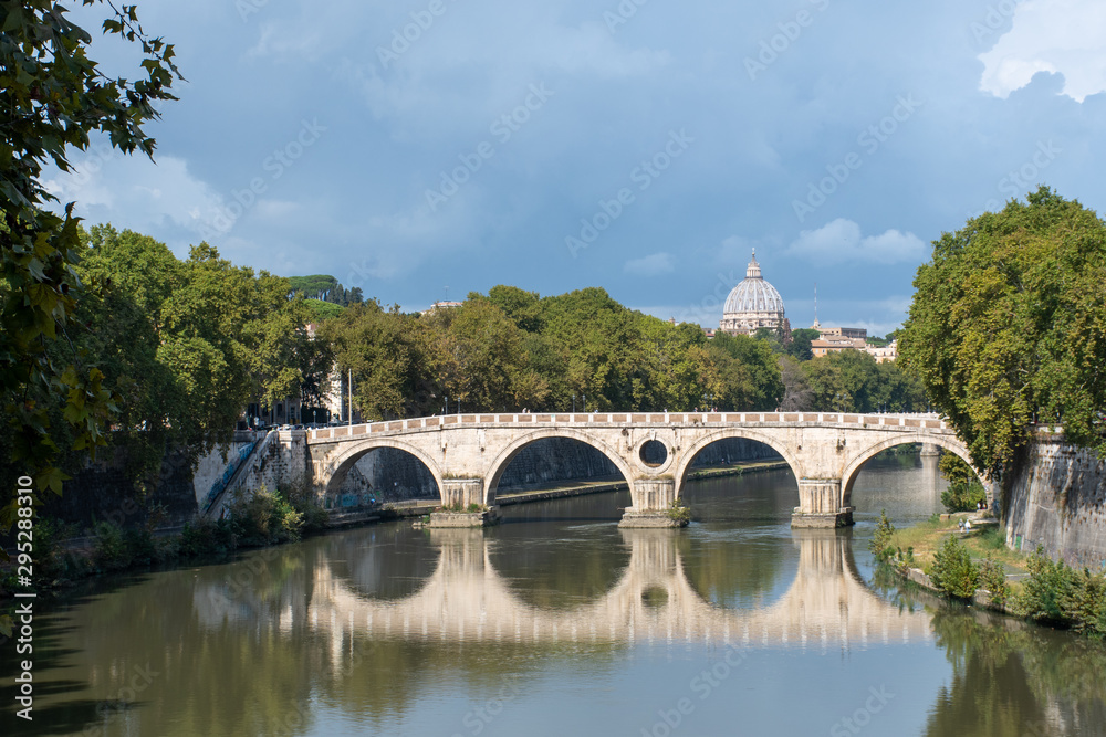 River Tiber and sisto bridge with St Peters in the distance Rome
