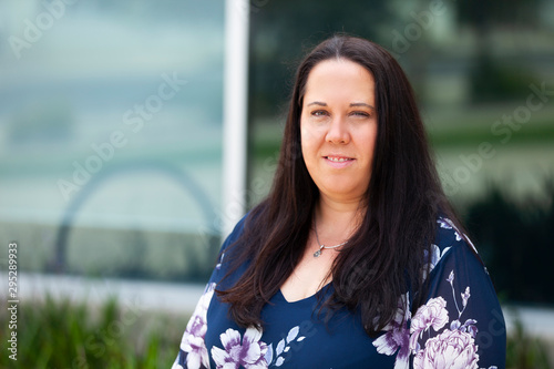 Business woman female relaxed corporate headshot