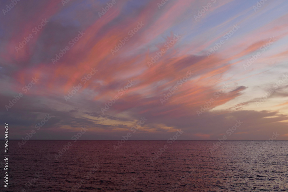 Fototapeta premium Sunset in Alghero, Sardinia, Italy. Colorful seascape on a summer night.