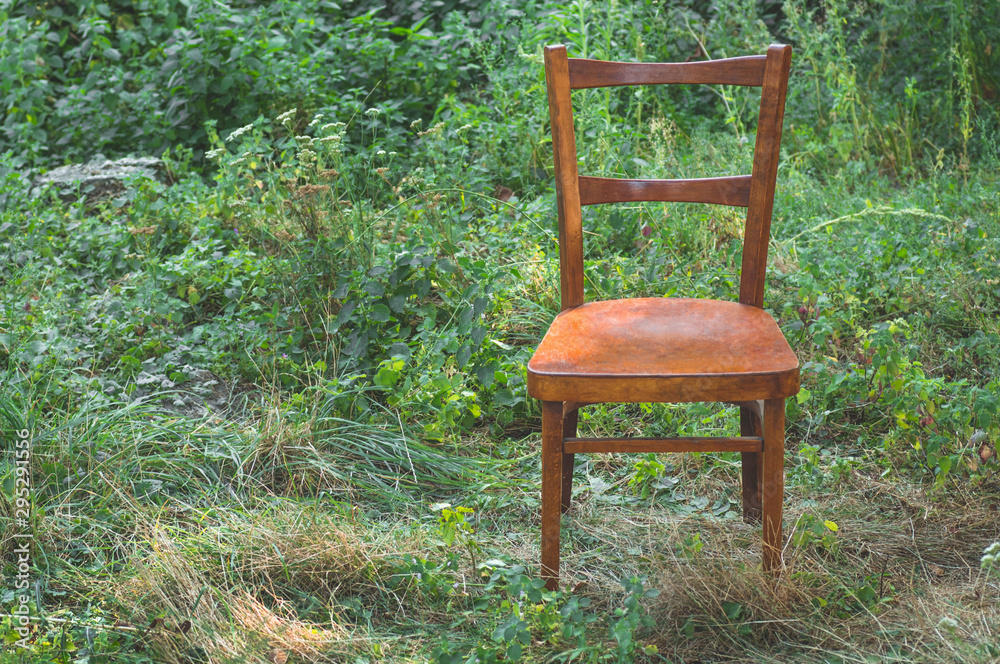 Pair old wooden chair outdoors. Two wooden folding chairs for rest. 