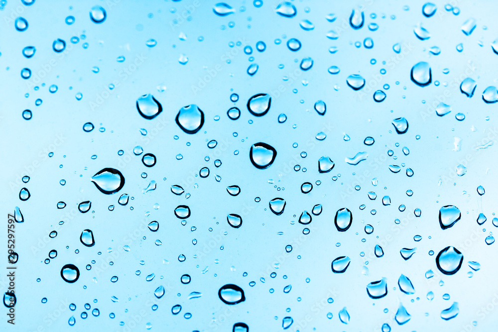 water drops on blue background water drops on blue background