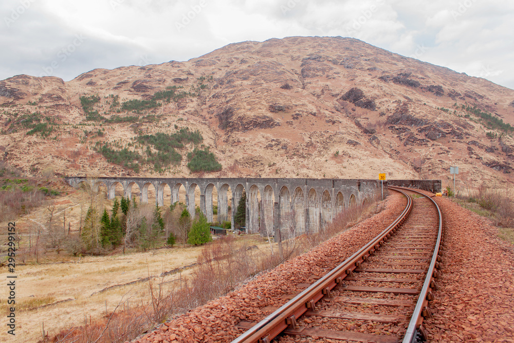 Detail of steam train on famous Glenfinnan viaduct, Scotland highlands Detail of steam train on famous Glenfinnan viaduct, Scotland highlands