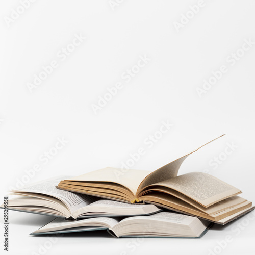 Front view open books with white background