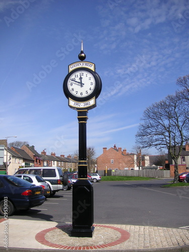 replica clock in a car park in borrows photo