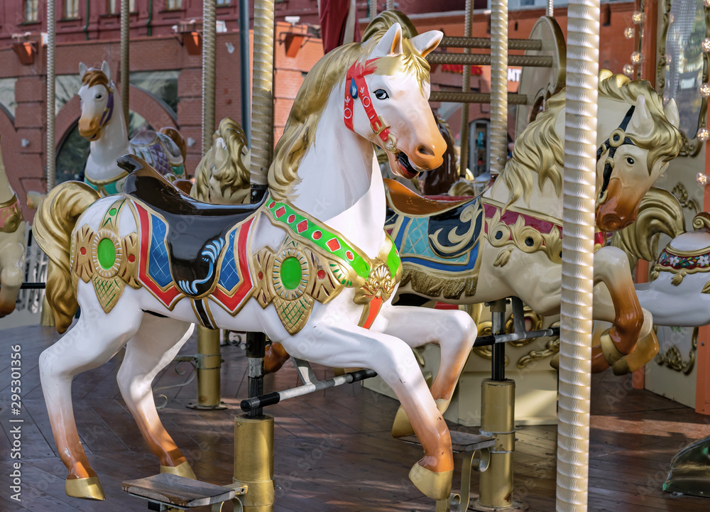 Horse in vintage style on a children's carousel.