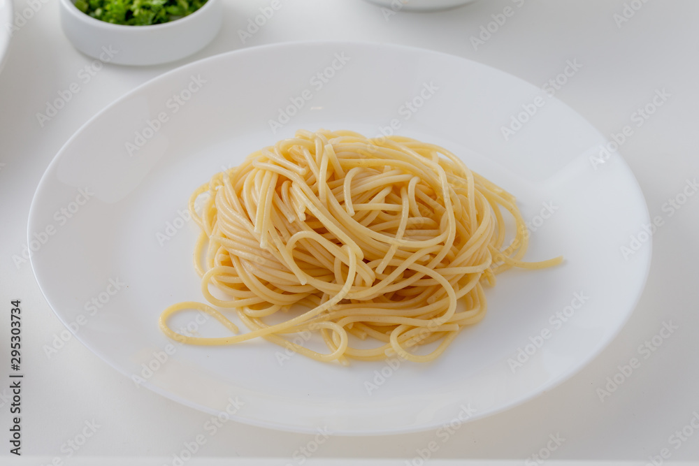 Spicy Spaghetti with Thai sausage isolaed whie Background. Spicy Spaghetti with Thai sausage isolaed whie Background.