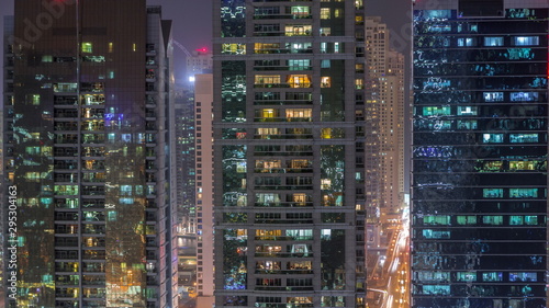 Residential and office buildings in Jumeirah lake towers district night timelapse in Dubai © neiezhmakov