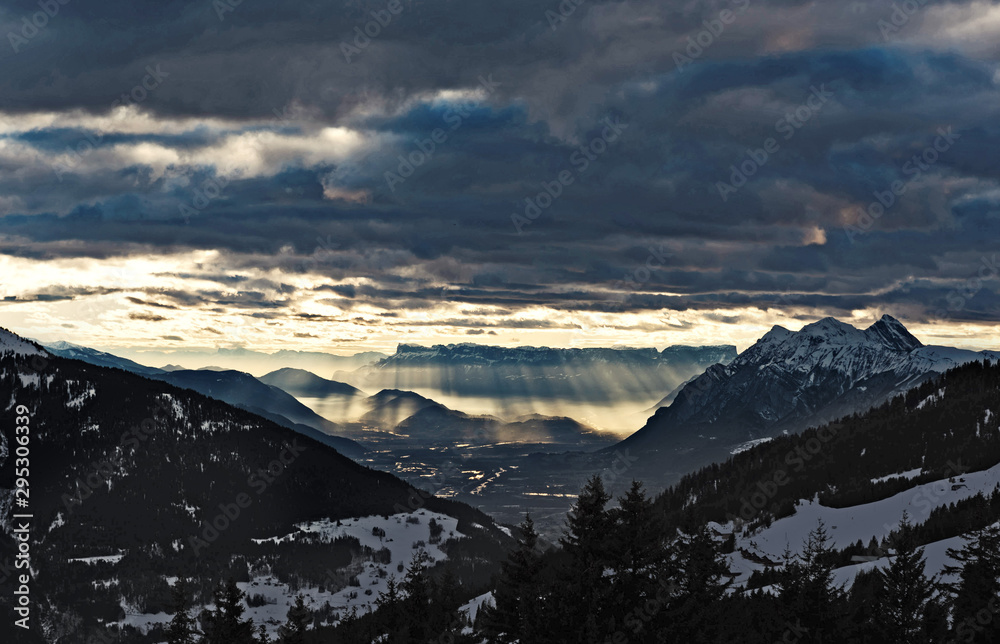 Albertville seen from the mountains in sun beams.