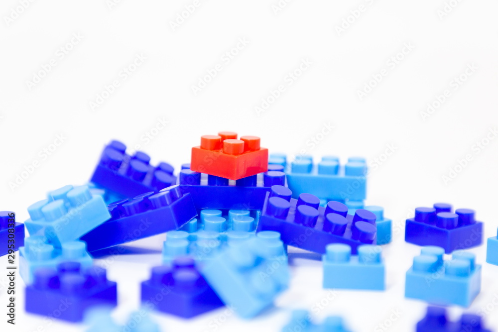 red brick block top leader outstanding out of all , performance prominent business concept . plastic toy for children . red brick block top leader outstanding out of all , performance prominent business concept . plastic toy for children .