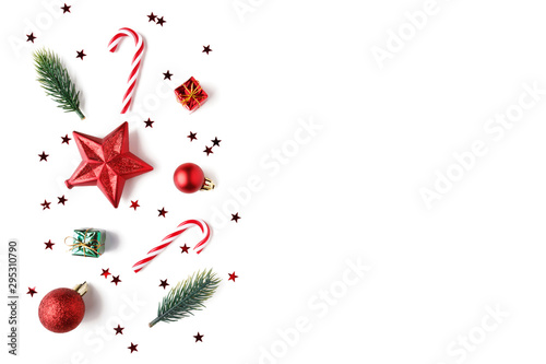 Christmas Red decorations, fir tree branches on white background. photo