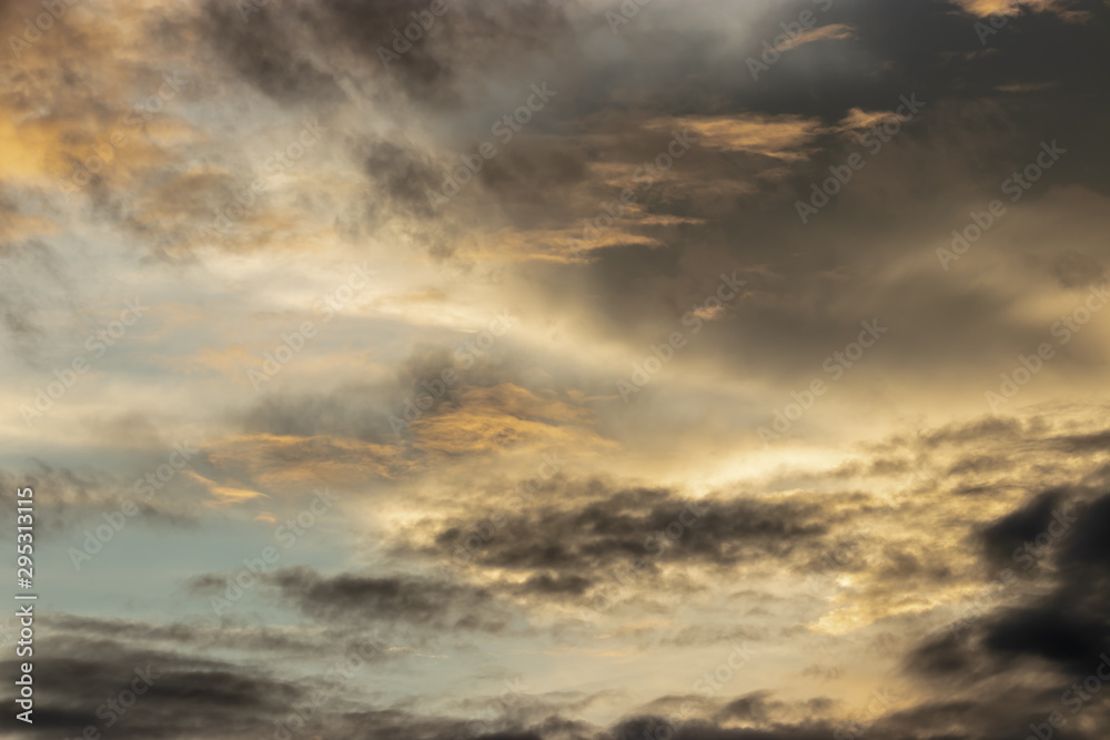 The background image of the evening sky has a beautiful golden light.