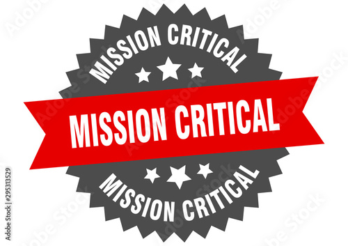 mission critical sign. mission critical red-black circular band label