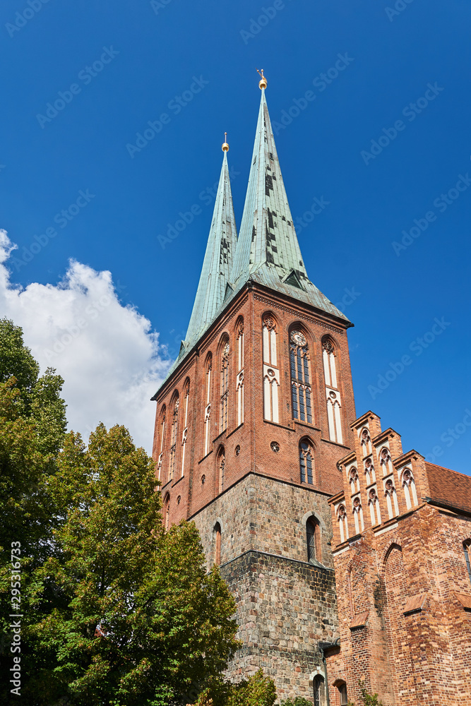 Obraz premium bell towers of the historic church, Gothic St. Nicholas Church in Berlin.