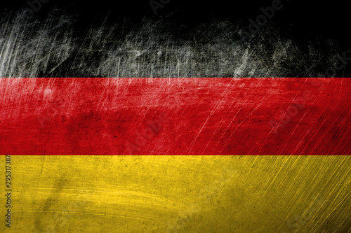 Fotografie German flag on metal rough texture, grunge flag