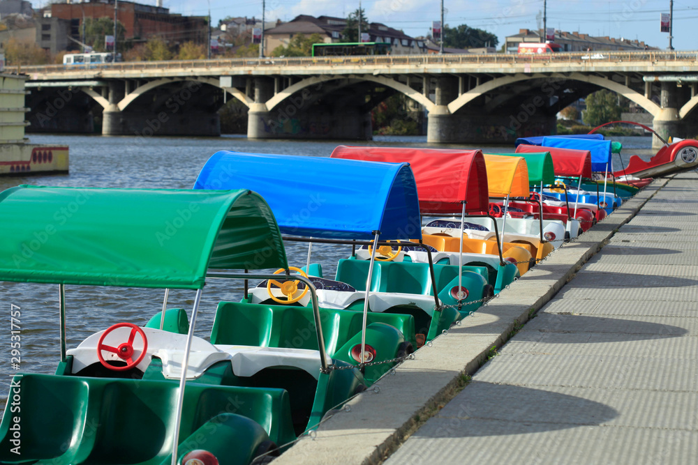 Fototapeta premium colorful boats standing on the river