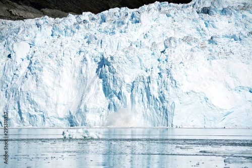 Disko Bay, Greenland - July - boat trip in the morning over the arctic sea - Baffin Bay - calving glacier eqi, world heritage, ice breaking from the edge photo