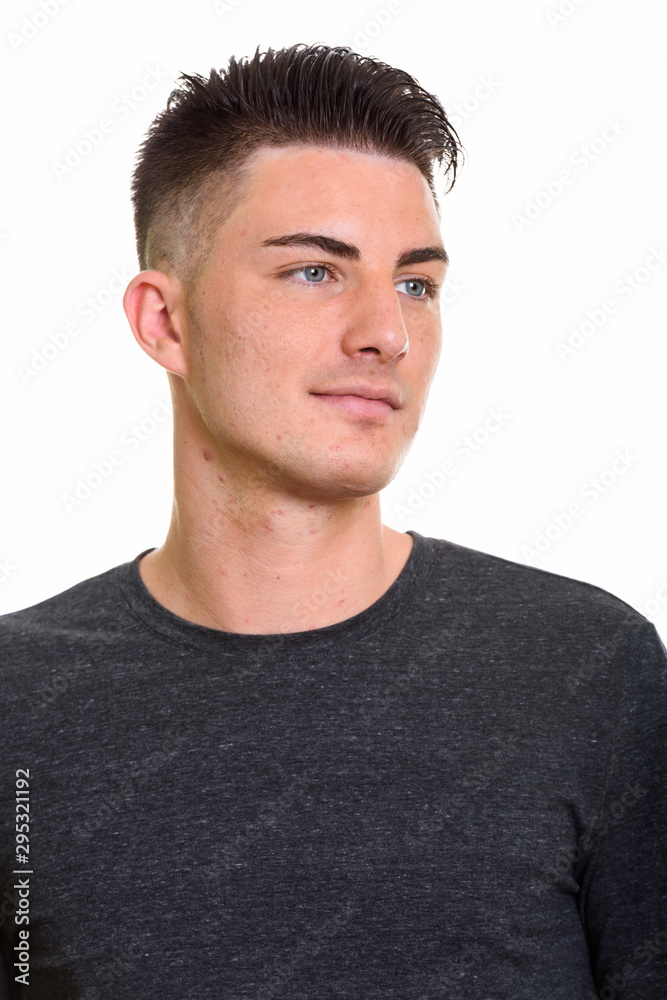 Studio portrait of Spanish man isolated against white background Studio portrait of Spanish man isolated against white background