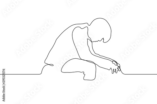 continuous line art silhouette of a man seated with his head bowed. The elbows rest on the knees. Sadness, despair, depression, failure. It can be used for animation. Vector