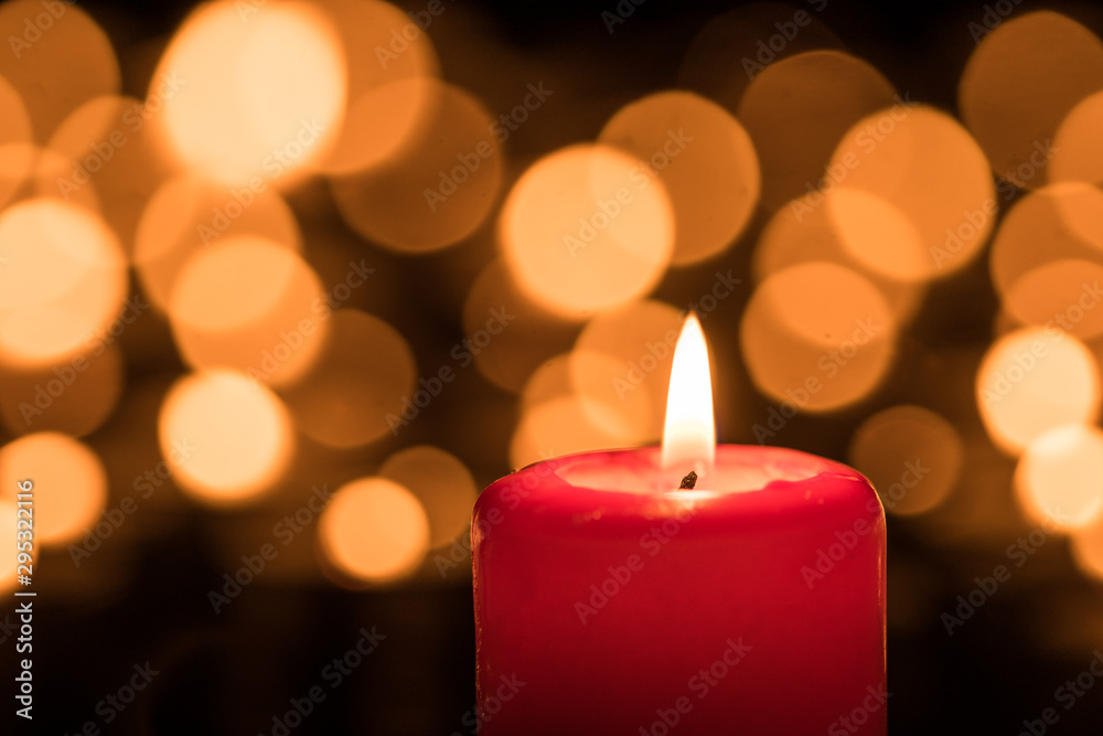 Burning candle during the first Sunday of Advent Burning candle during the first Sunday of Advent