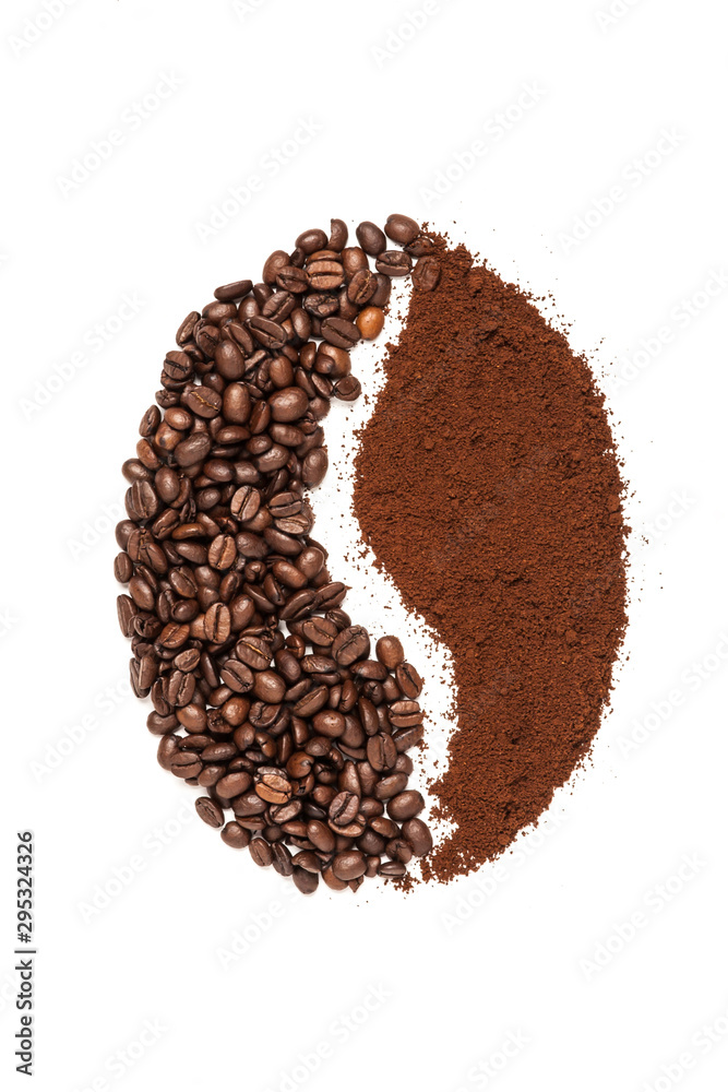 Coffee bean shape made of ground coffee and beans. Flat lay, tpo view Coffee bean shape made of ground coffee and beans. Flat lay, tpo view