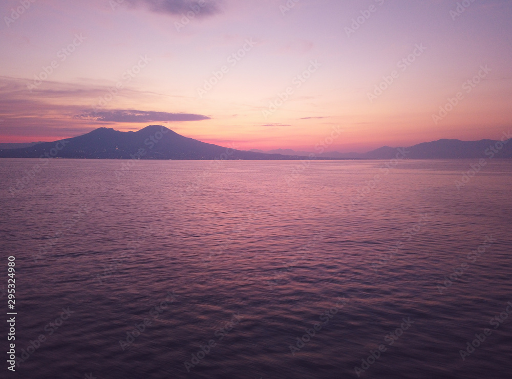 View of Naples city from the sea at summer sunrise View of Naples city from the sea at summer sunrise