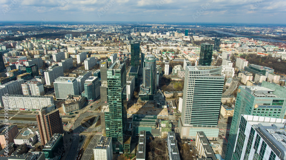 Skyscrapers in the center of the financial district of Warsaw in the daytime. Poland. 10. March. 2019. Aerial view of the cityscape with skyscrapers and buildings in the business center.