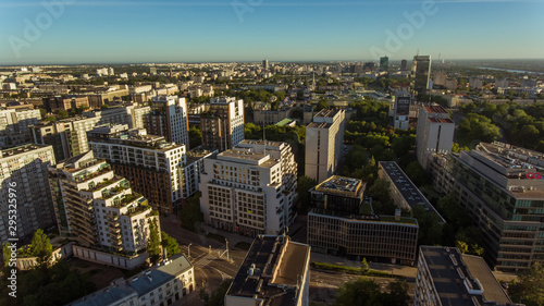 City skyscrapers at sunrise in the business center of Warsaw. Poland. 17. October. 2019. Amazing panorama view of Warsaw skyline and skyscraper at sunrise. Warm morning colors.  