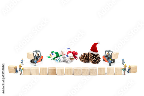 Miniature worker with wood block and pine cone , euro banknote isolated on white background , Image for Christmas Holiday and Happy New Year Gift Celebration concept.
