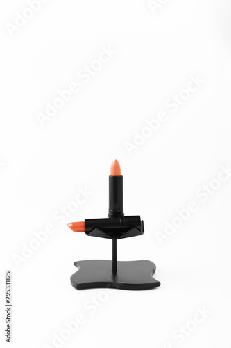 Front view of lipstick on plain background