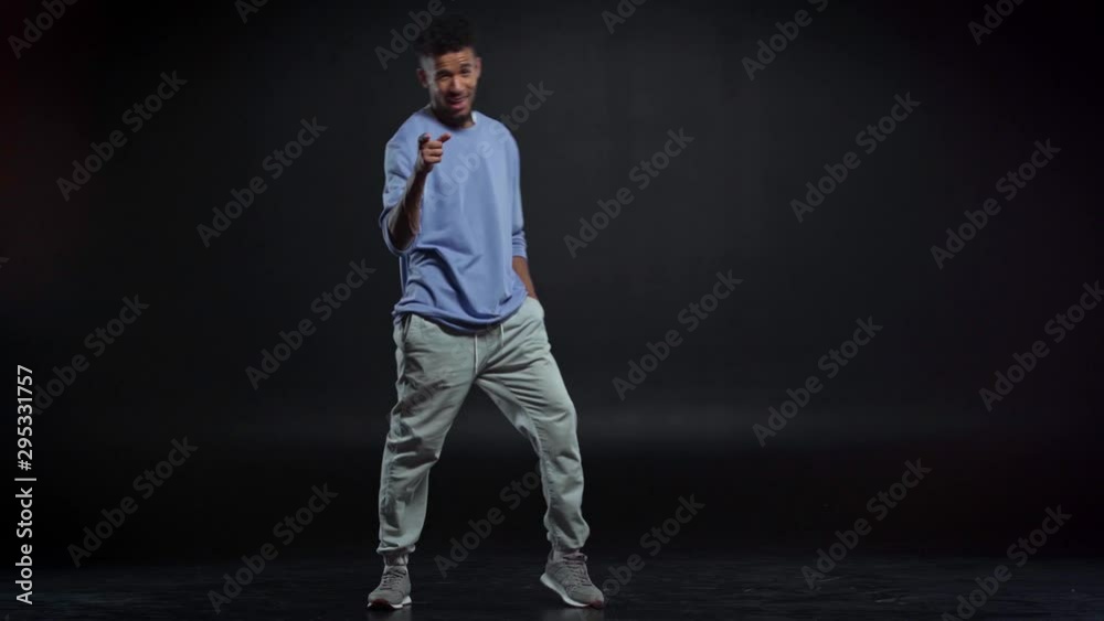 handsome african american man dancing on black handsome african american man dancing on black