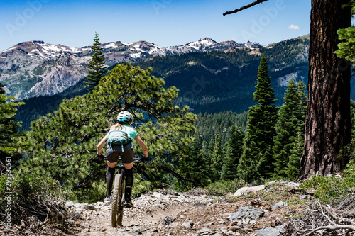 female mountain biker and scenic view photo