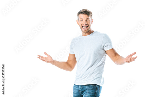 excited man gesturing and looking at camera isolated on white