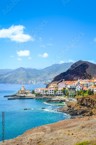Picturesque Marina da Quinta Grande in Portuguese island Madeira. Small village, harbor located by Ponta de Sao Lourenco. Rocks and hills behind the city by the Atlantic ocean. Cities. Travel spot