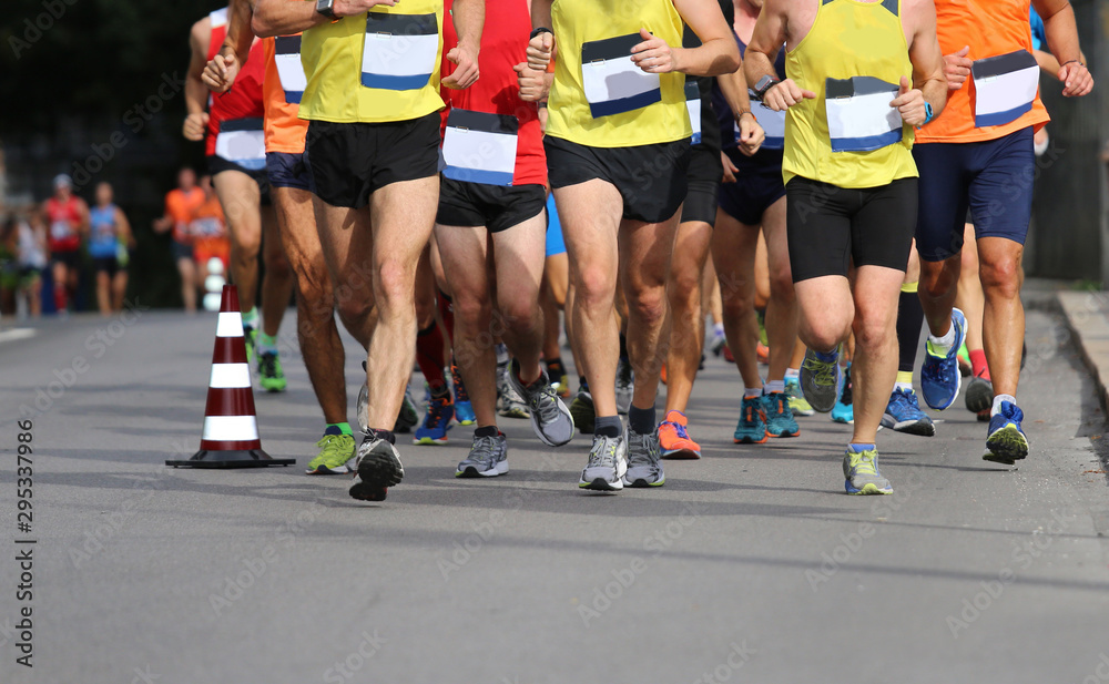 runners on the road during the Marathon race