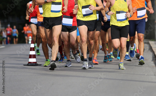 runners on the road during the Marathon race