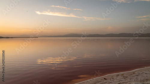 Sunset over the coast of Maharloo pink lake, Shiraz, Iran