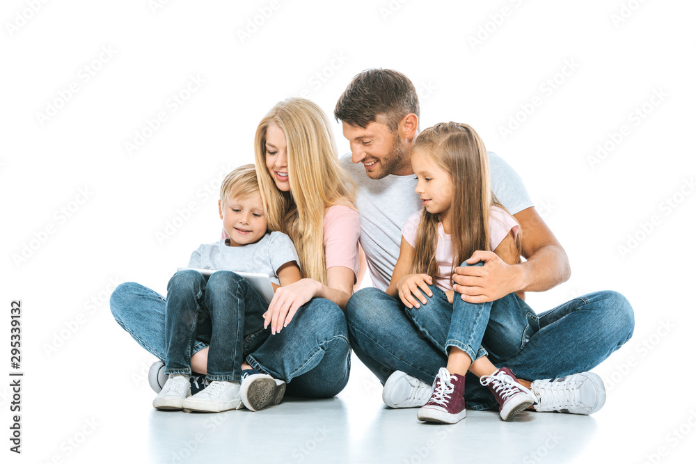 happy kids sitting near cheerful parents on white happy kids sitting near cheerful parents on white
