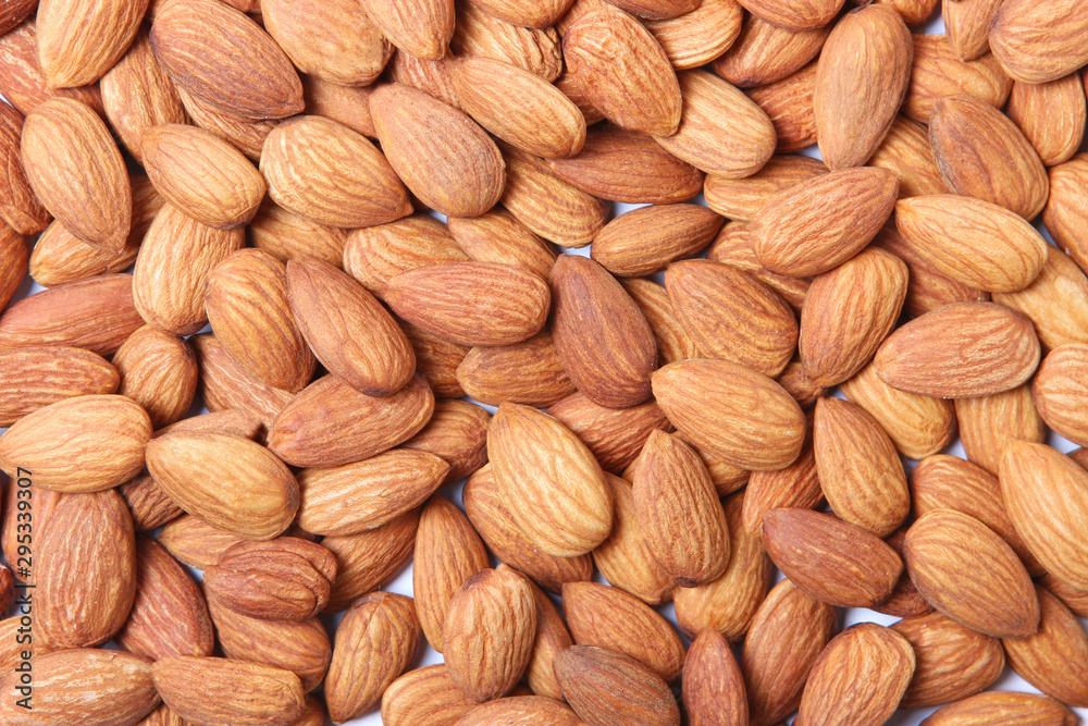 Almond background. Whole almonds. Almond background. Whole almonds.