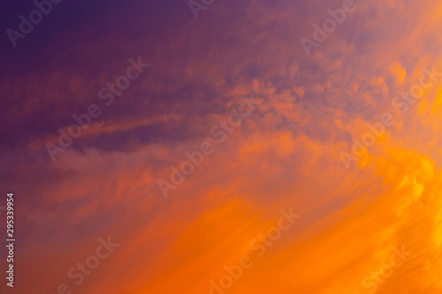 Beautiful red clouds in the sky at sunset. Nature background.