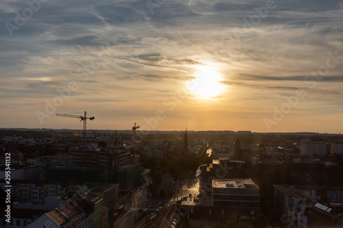 The setting sun over Szczecin. Summer time © Adga