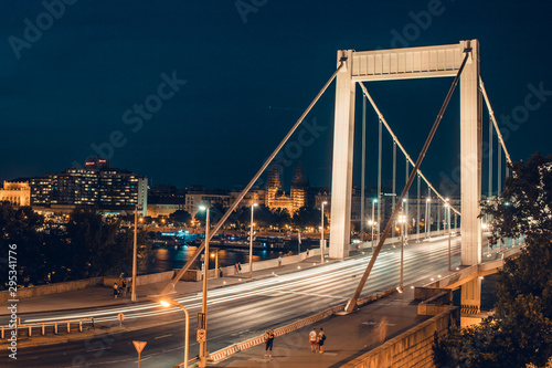 Night time traffic over the Elisabeth bridge. It crosses Danube river and connect Buda and Pest together. Budapest, Hungary.
