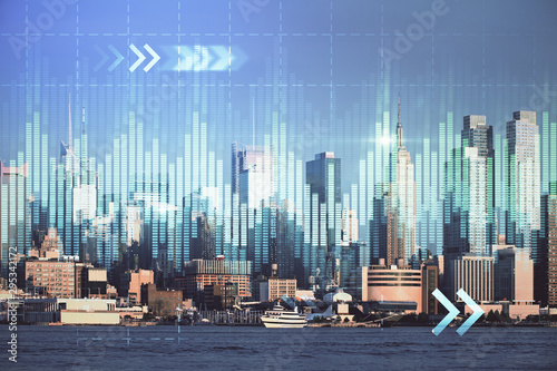 Forex graph on city view with skyscrapers background double exposure. Financial analysis concept.