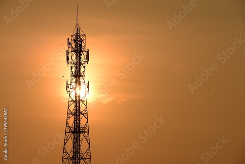 Wireless Communication Antenna With bright sky.Telecommunication tower with antennas. 