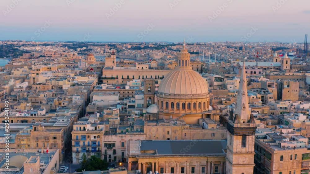 Aerial view of Valletta, Malta with Basilica of Our Lady of Mount Carmel at sunset Aerial view of Valletta, Malta with Basilica of Our Lady of Mount Carmel at sunset