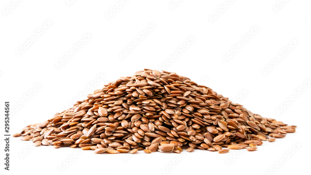Pile of flax seeds close up on a white. Isolated. Pile of flax seeds close up on a white. Isolated.