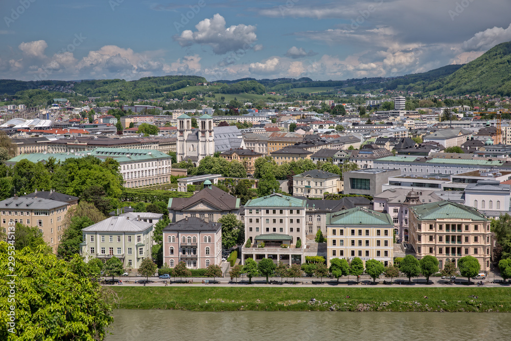 Beautiful view of Salzach river and the garden in Schloßpark Mirabell in Salzburg with Barockmuseum and church St. Andrä, Austria