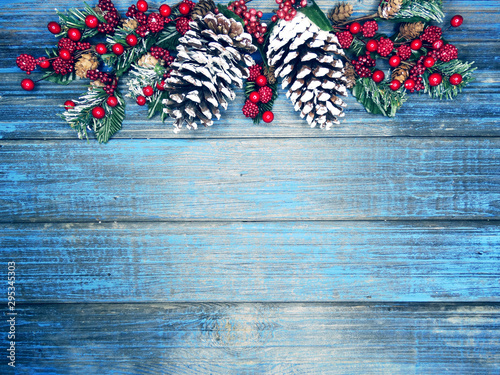 winter background with fir branches cones and snow