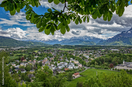 Beautiful view from the fortress Hohensalzburg to the south side of Salzburg, showing the Nonntal  and the mountains of Hallein and Berchtesgaden in Austria and Germany photo