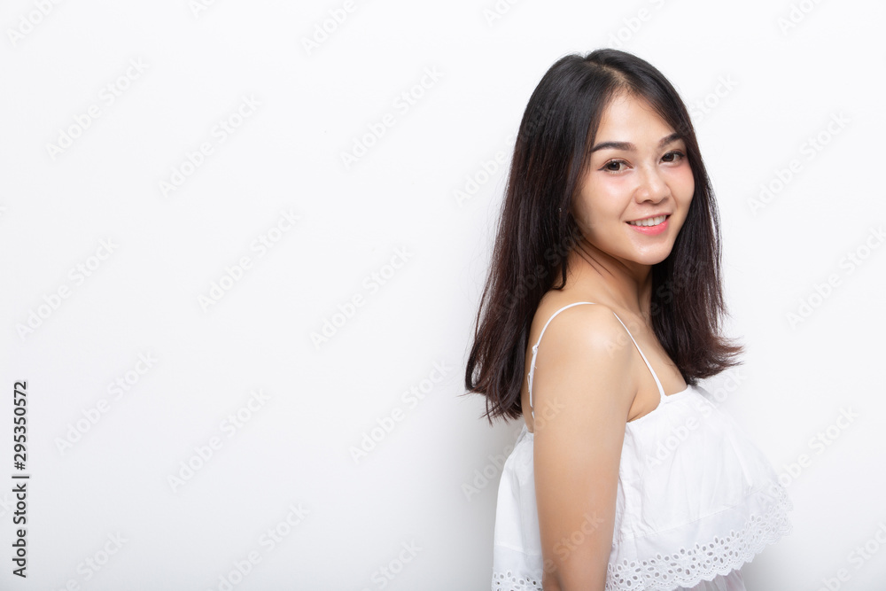 Beautiful young woman portrait. Studio shot, isolated on gray background Beautiful young woman portrait. Studio shot, isolated on gray background