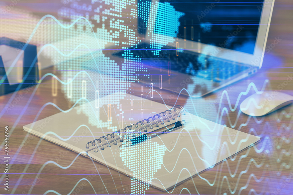 Obraz premium Multi exposure of graph and financial info and work space with computer background. Concept of international online trading.